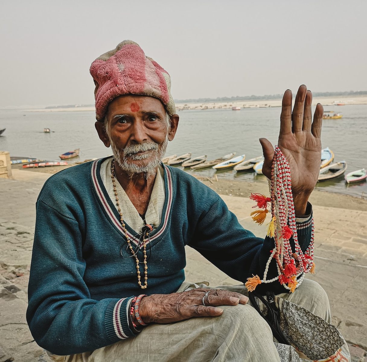 a man sitting on a dock