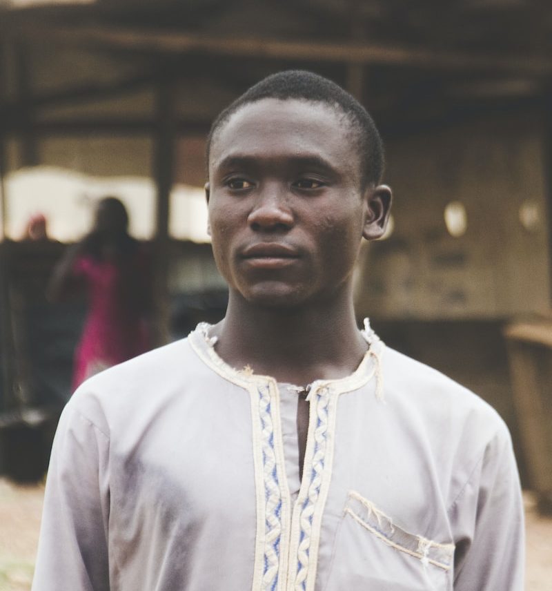 man wearing grey shirt during daytime